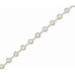 A DIAMOND-SET BRACELET, BY CHATILA
Each bombé link pavé set with brilliant-cut diamonds, with