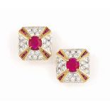 A PAIR OF RUBY AND DIAMOND EARRINGS
Each circular-cut ruby within a square mount set with