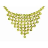 A 14CT GOLD PERIDOT BIB NECKLACE
Set throughout with circular-cut peridot, London hallmark, 40.0 cm