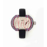 A GEM-SET 'OFFSET' QUARTZ WRISTWATCH, BY JAHAN
The tonneau-shaped dial pavé-set with diamonds,