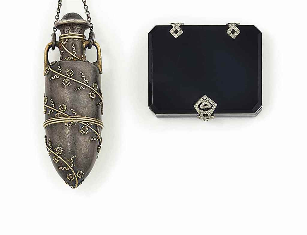 A LATE 19TH CENTURY SILVER PENDANT, BY TIFFANY & CO AND AN ART DECO VESTA CASE
The first of