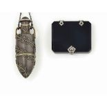 A LATE 19TH CENTURY SILVER PENDANT, BY TIFFANY & CO AND AN ART DECO VESTA CASE
The first of