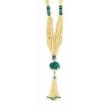A SEED PEARL, EMERALD, DIAMOND AND ONYX NECKLACE
Composed of multiple strands of seed pearls with