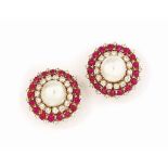 A PAIR OF CULTURED PEARL, RUBY AND DIAMOND EARRINGS
Each central cultured pearl, measuring