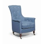 AN EARLY VICTORIAN MAHOGANY ARMCHAIR
MID-19TH CENTURY
Re-upholstered in blue tweed, on turned feet