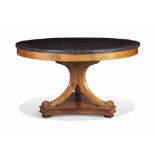 A NORTH EUROPEAN WALNUT CENTRE TABLE
LATE 19TH CENTURY
The black marble top above a scrolled