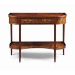 A ENGLISH EBONISED AND MAHOGANY CONSOLE DESSERTE
19TH CENTURY
The three-quarter galleried top