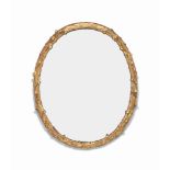 A LATE VICTORIAN GILTWOOD LARGE OVAL MIRROR
LATE 19TH CENTURY
The frame simulating tree branches