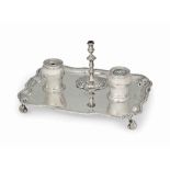 A GEORGE II SILVER INKSTAND
MARK OF WILLIAM GRUNDY, LONDON, 1751
Shaped rectangular with gadroon