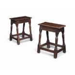 A PAIR OF CHARLES II OAK JOINED STOOLS
LATE 17TH CENTURY
Each with linenfold and dot detail to the