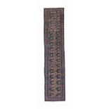 An antique Bijar runner
approx: 16ft.10in. x 3ft.9in.(513cm. x 114cm.)