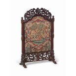 A WILLIAM AND MARY WALNUT AND NEEDLEWORK SCREEN
CIRCA 1690
The screen with pierced crestings and