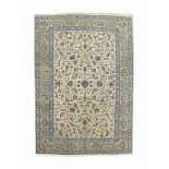 A fine Kashan carpet
approx: 13ft.7in. x 9ft.5in.(414cm. x 286cm.)