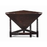 A WILLIAM AND MARY WALNUT AND OAK FOLDING TABLE
LATE 17TH CENTURY
With triangular top and leaf, on