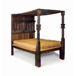 AN ELIZABETHAN OAK CHEQUER AND FLORAL MARQUETRY TESTER BED
LATE 16TH CENTURY, PROBABLY WEST