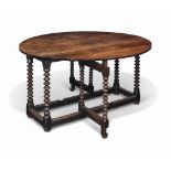 A WILLIAM AND MARY OAK GATE-LEG TABLE
LATE 17TH CENTURY
With oval top and multiple ring-turned