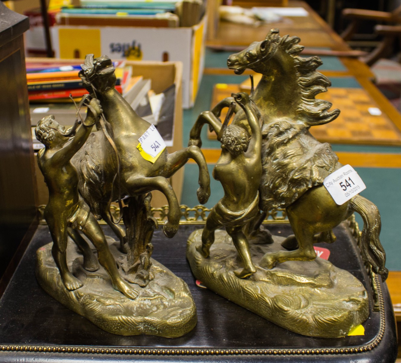 PAIR OF BRASS FIGURES WITH PRANCING HORSES