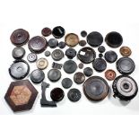 (lot of approximately 40) Group of Chinese wood stands, including circular bases of various sizes,