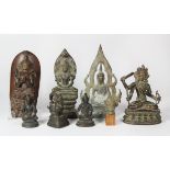 (lot of 8) Group of Asian metal sculptures, consisting of Manjusri, Shakyamuni, medicine Buddha