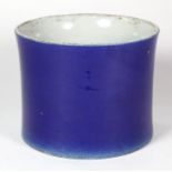 Chinese blue glazed porcelain brush pot, of cylindrical form and the bottom with apocryphal Kangxi