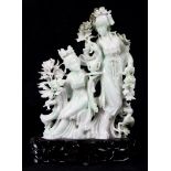 Chinese jade sculpture with light green hue, two celestial beauties with cranes and flowers, one