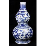 Chinese blue and white porcelain wall vase, of double gourd form with stiff leaves and ruyi