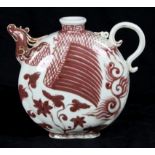 Chinese underglazed red wine ewer, with a phoenix head spout, the compressed globular body painted