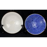 (lot of 2) Chinese Ding type porcelain plates, the centers with peonies, surrounded with lobe and