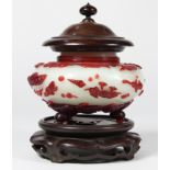 Chinese overlay Peking glass vessel and stand, the compressed body with red colored fish and other