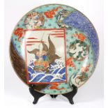 Japanese Kutani charger, centered with a rectangular panel depicting Urashima and Umigame, with