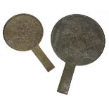 (lot of 2) Japanese bronze mirrors, decorated with plants and berries, names inscribed, one with