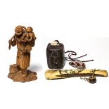 (lot of 3) Two Japanese Meiji period items; the first, a boxwood carving of fisherman with octopus