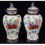 Pair of Chinese export porcelain vases, of hexagonal section decorated with floral sprigs;