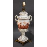 European porcelain lamp, urn form, flanked with two scrolled handles, depicting a Colonial period