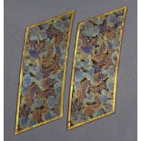 Pair of Chinese cloisonne enameled plaques, in the form of a parallelogram and each decorated with a