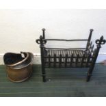 A vintage fire grate and copper coal hod