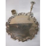 A sterling silver presentation tray 1905 togeather with a silver candlestick and a napking ring