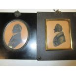 A pair of 19th century silhouettes