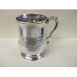 A Georgian sterling silver tankard London 1775/76 by Walter Brind