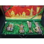 A large cased plated teaset