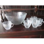 A lead crystal punch bowl and 6 cups