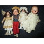 4 Bisque head dolls to include an AM 351