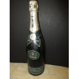 A bottle of Moet Chandon Champagne special edition 1977  Silver Jubilee Cuvee