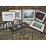 A box of framed prints and wood cuts