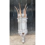 An early 20th century post cap light fitting