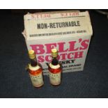 A box of 12 Bells extra special old Scotch Whisky each 26 2/3 fluid ounces