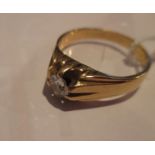 A gents 18ct gold ring set with solitare diamond