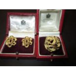 An 18ct yellow gold stylised floral ring with matching 18ct gold clip-on earings both by Asprey & Co