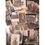 Approximately 60 WWI photographic postcards many of troops