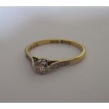 An 18ct gold and platinum diamond ring